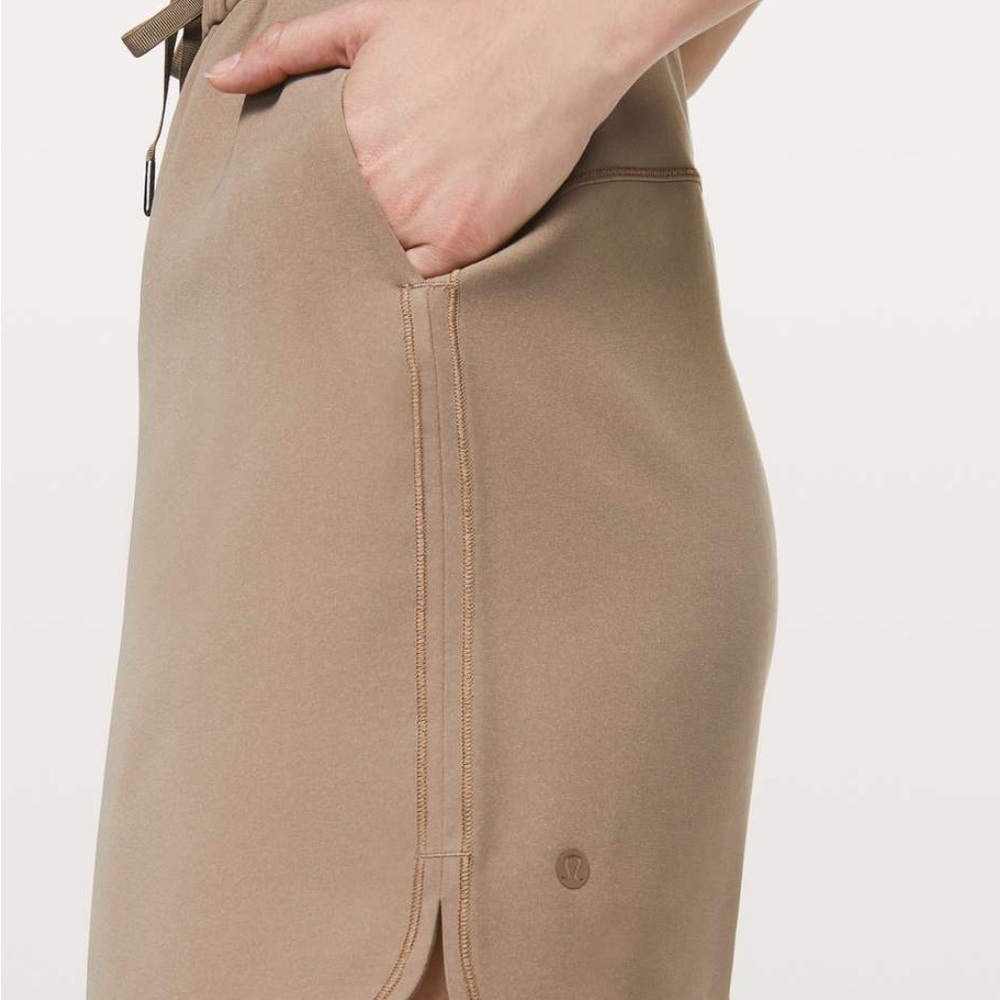 Lululemon on the move skirt in dark khaki. Like new